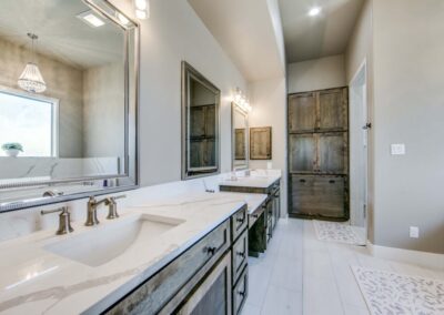 Custom Home Bathroom Design with his dual sinks and vanity.
