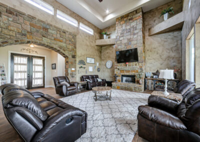 Traditional materials like stone, marble, and wood used in a new custom build.